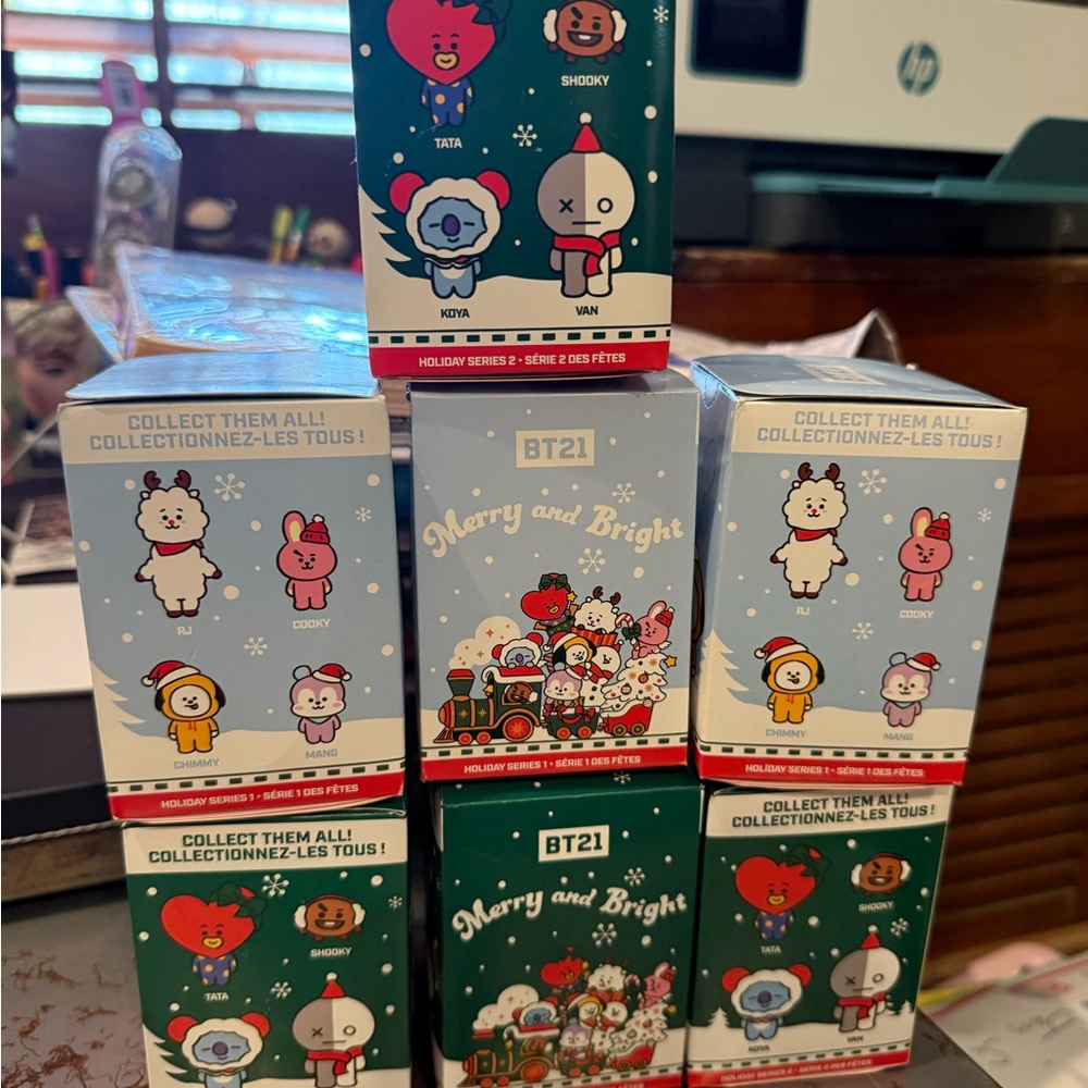 BT21. holiday series 1 and 2 ——7 total blind boxes brand new unopened.